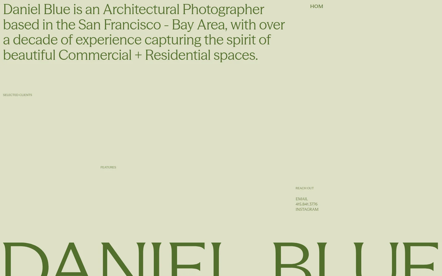 The desktop page features a minimalist design with a large hero image of a white vase with flowering branches on a wooden sideboard. A large headline introduces Daniel Blue as an architectural photographer against a light sage green background. The layout includes a navigation menu at the top, a list of selected clients, and contact information at the bottom right.