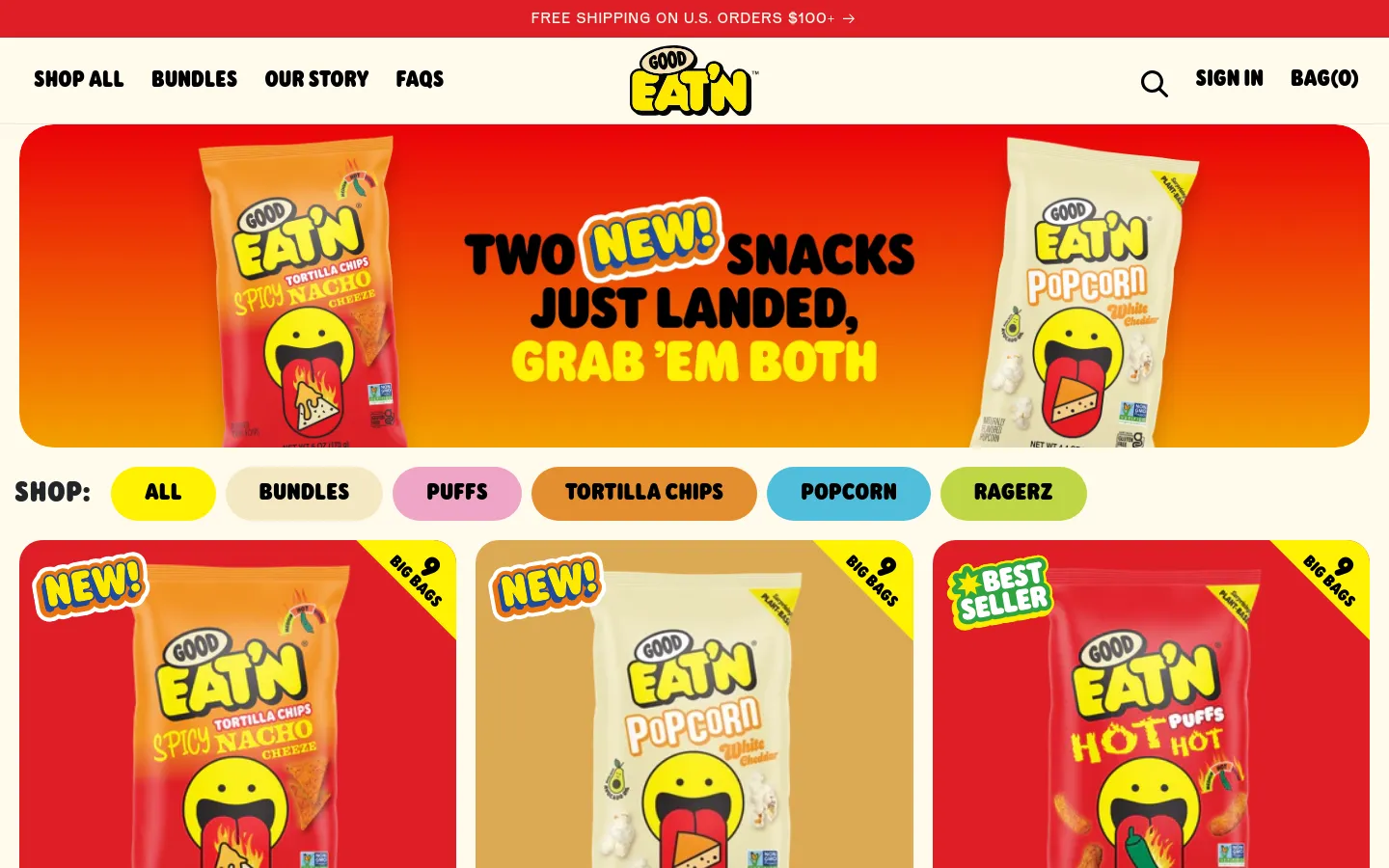 The desktop view shows a vibrant red and orange hero banner featuring two new snack bags with the text 'TWO NEW! SNACKS JUST LANDED, GRAB 'EM BOTH'. Below the banner, a horizontal row of rounded category buttons includes All, Bundles, Puffs, Tortilla Chips, Popcorn, and Ragerz, followed by a grid of product cards.