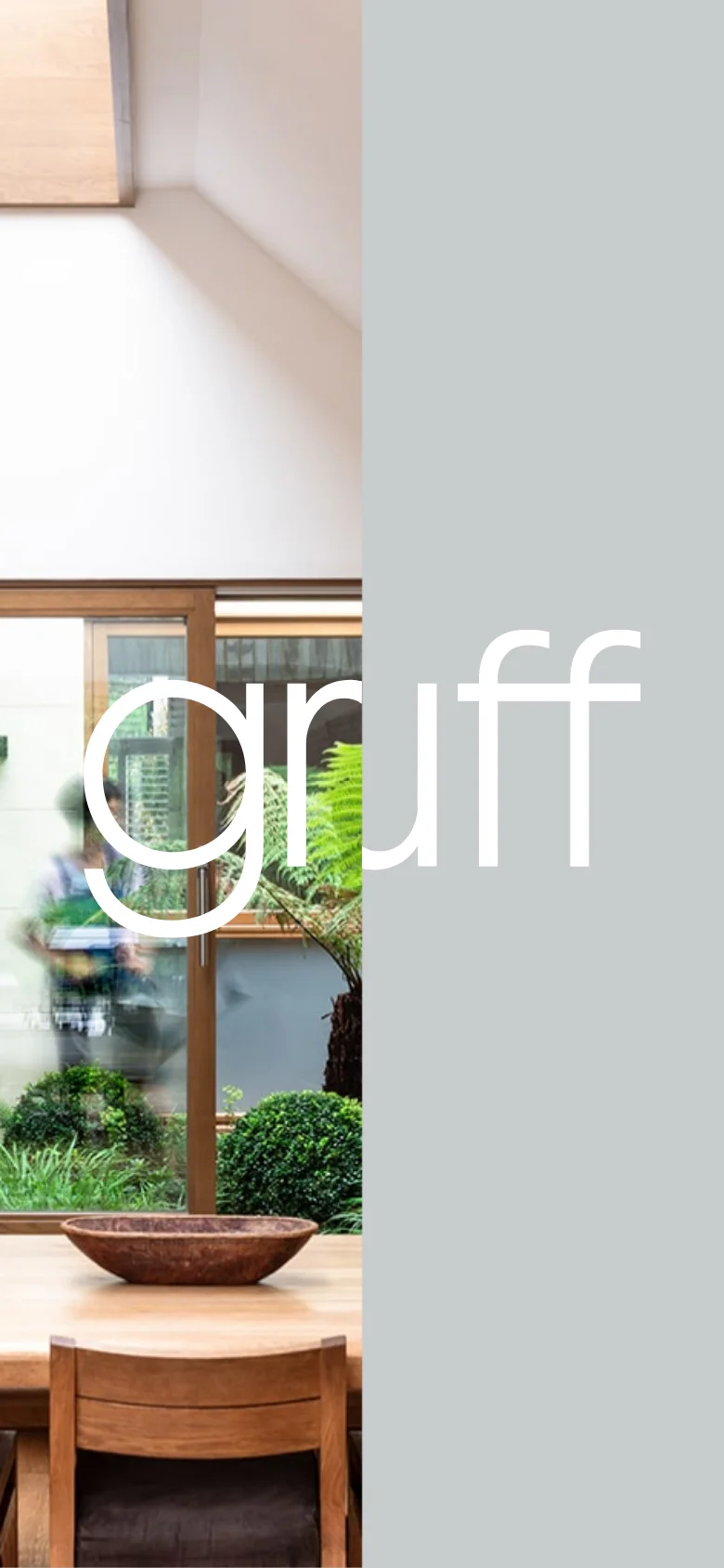 The mobile version adapts the split-screen hero into a vertical stack. The large white 'gruff' text is centered over a light gray background, positioned above a full-width photograph of a bright, modern interior featuring wooden furniture and greenery. This layout prioritizes vertical scrolling and clear brand visibility on a narrow screen.