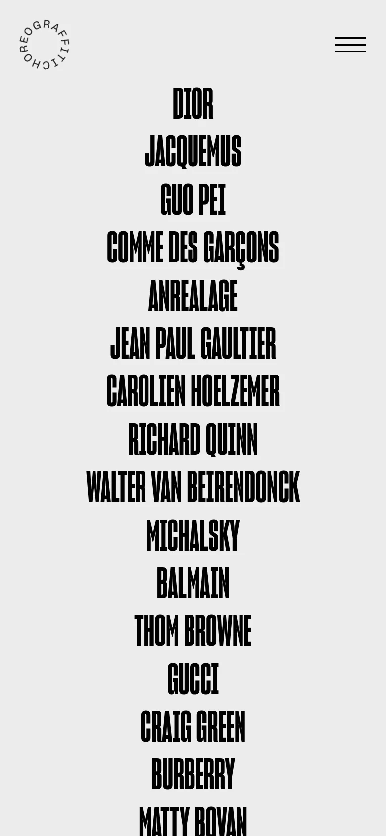 The mobile version maintains the minimalist aesthetic with a light gray background and large, bold, black text listing various fashion brands in a single vertical column. The layout is simplified for a narrow screen, focusing entirely on the brand names as the primary content.