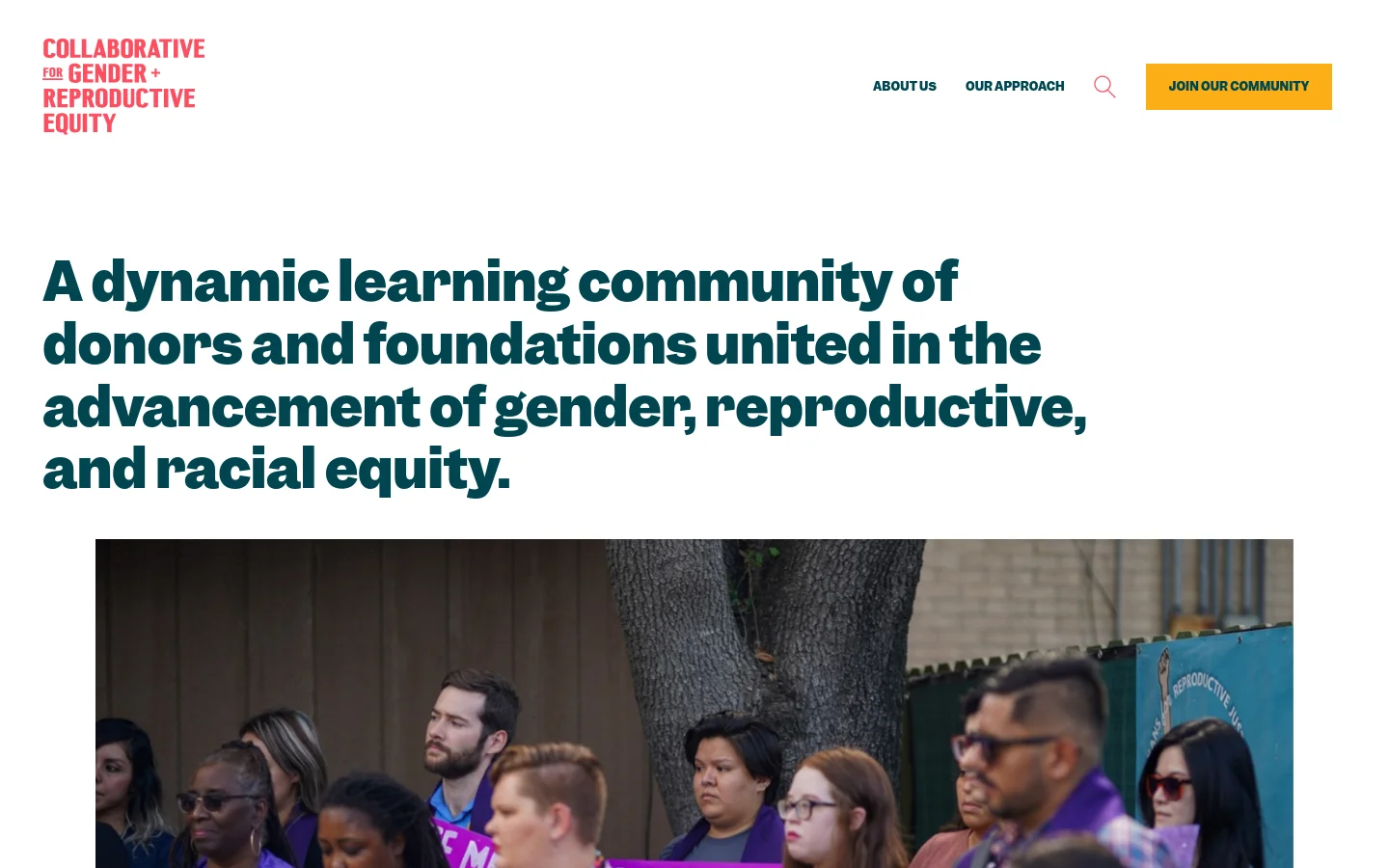 The desktop homepage features a white header with a red logo on the left, navigation links for 'About Us' and 'Our Approach', a search icon, and a yellow 'Join Our Community' button. A large, dark teal headline dominates the center, positioned above a wide photograph of a diverse group of people outdoors. The layout is spacious with a clean, minimalist aesthetic.
