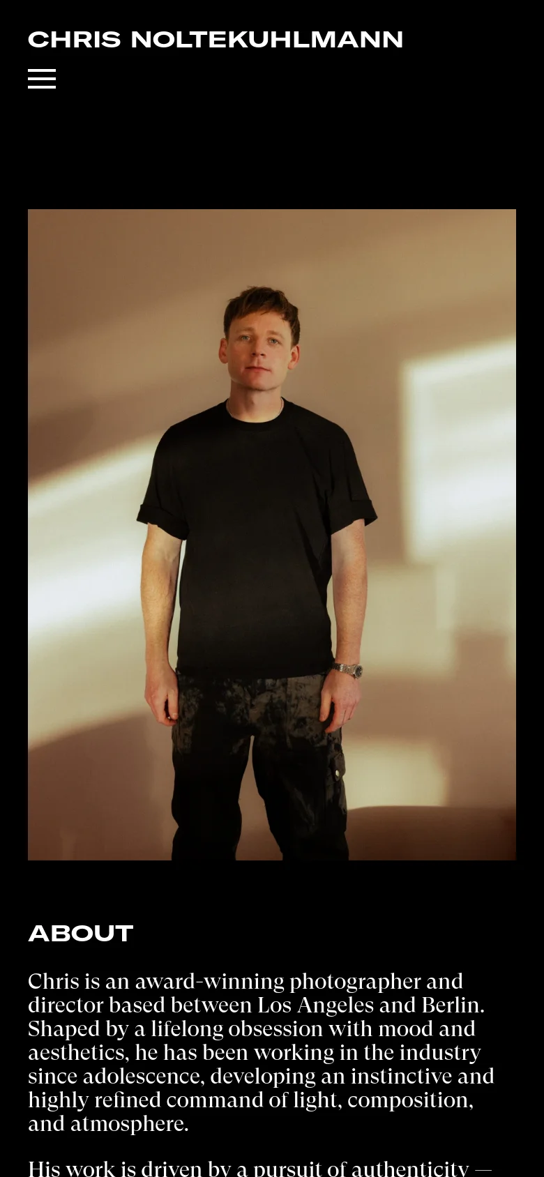 The mobile version uses a vertical layout on a black background. The portrait of Chris Noltekuhlmann appears at the top, followed by the 'About' heading and his biographical text below. A hamburger menu icon is visible in the top left corner, replacing the desktop's horizontal navigation bar.