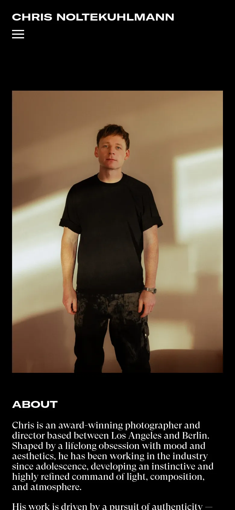 The mobile version uses a vertical layout on a black background. The portrait of Chris Noltekuhlmann appears at the top, followed by the 'About' heading and his biographical text below. A hamburger menu icon is visible in the top left corner, replacing the desktop's horizontal navigation bar.