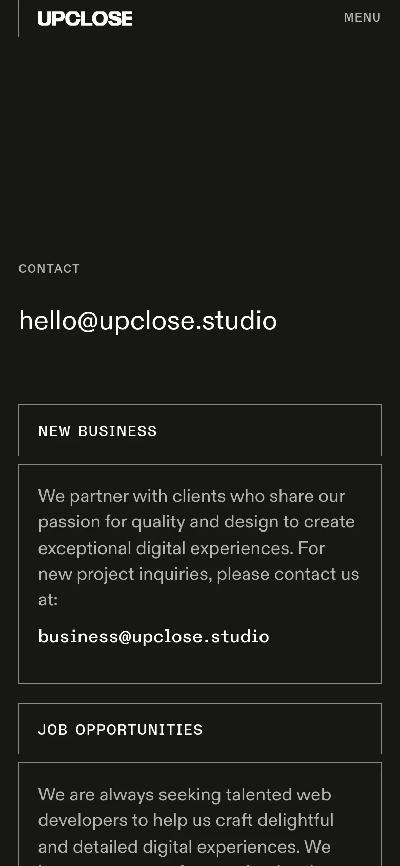 The mobile version maintains the dark aesthetic but uses a single-column vertical layout. The contact email is prominently displayed at the top, followed by the 'New Business' card and then the 'Job Opportunities' card stacked underneath. The top navigation is condensed into a 'MENU' button next to the logo.