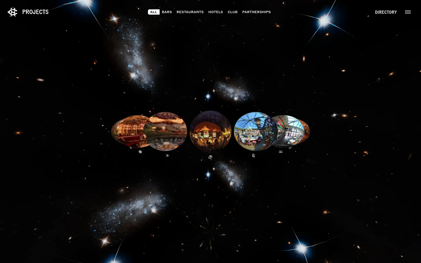 A desktop view of the CH Projects portfolio page featuring a dark, cosmic space background with stars and galaxies. A horizontal navigation menu at the top includes links for All, Bars, Restaurants, Hotels, Club, and Partnerships. The center of the screen displays a row of spherical, orb-like project previews against the starfield.