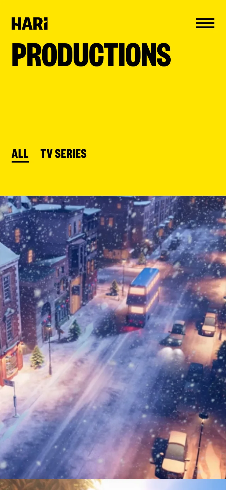 The mobile version maintains the bright yellow color scheme and bold black typography but uses a condensed layout. The navigation menu is replaced by a hamburger icon in the top right, and the 'PRODUCTIONS' headline and filter links are stacked vertically. The large snowy city street hero image remains prominent at the bottom of the view.