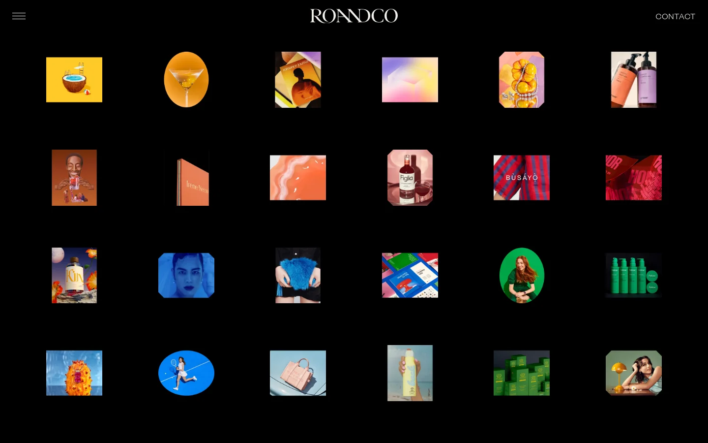 The RoAndCo homepage features a minimalist black background with a white logo at the top center and a contact link on the right. A grid of colorful, diverse project thumbnails displays various branding works, including product photography, illustrations, and editorial layouts. The layout is clean and spacious, emphasizing a high-contrast, visual-first portfolio approach.