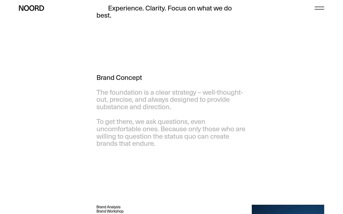 The desktop version features a minimalist white layout with black text and a large hero headline: 'Experience. Clarity. Focus on what we do best.' Below, service sections like 'Brand Concept' are organized with descriptive text and lists of specific expertise, utilizing ample whitespace and a clean, professional aesthetic.