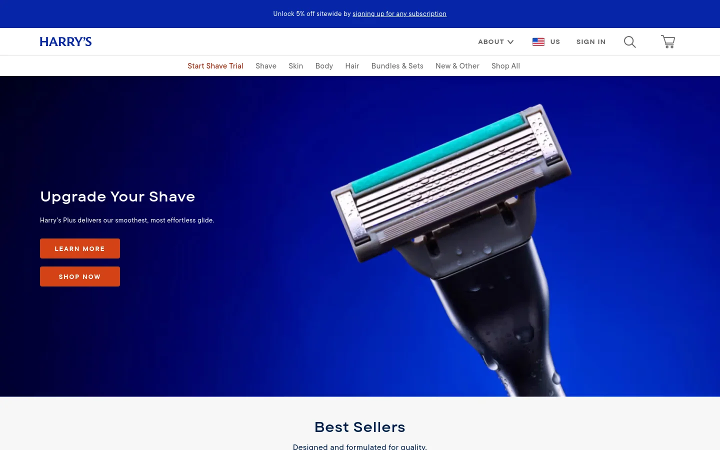 The Harry's homepage features a large hero image of a black razor with a teal blade against a vibrant blue background. A white headline reads 'Upgrade Your Shave' above two orange call-to-action buttons: 'LEARN MORE' and 'SHOP NOW'. The top navigation bar includes the Harry's logo, links for Shave, Skin, Body, and Hair, and icons for search and a shopping cart.