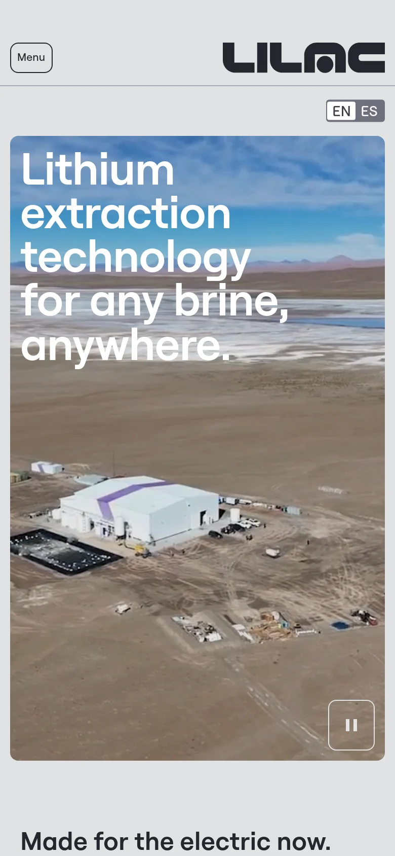 The mobile version presents a vertically oriented view of the desert landscape hero video, with the headline text stacked to fit the narrower screen. The top navigation is condensed into a 'Menu' button on the left, while the Lilac logo remains centered at the top. The layout prioritizes the large-scale visual imagery and the primary headline.