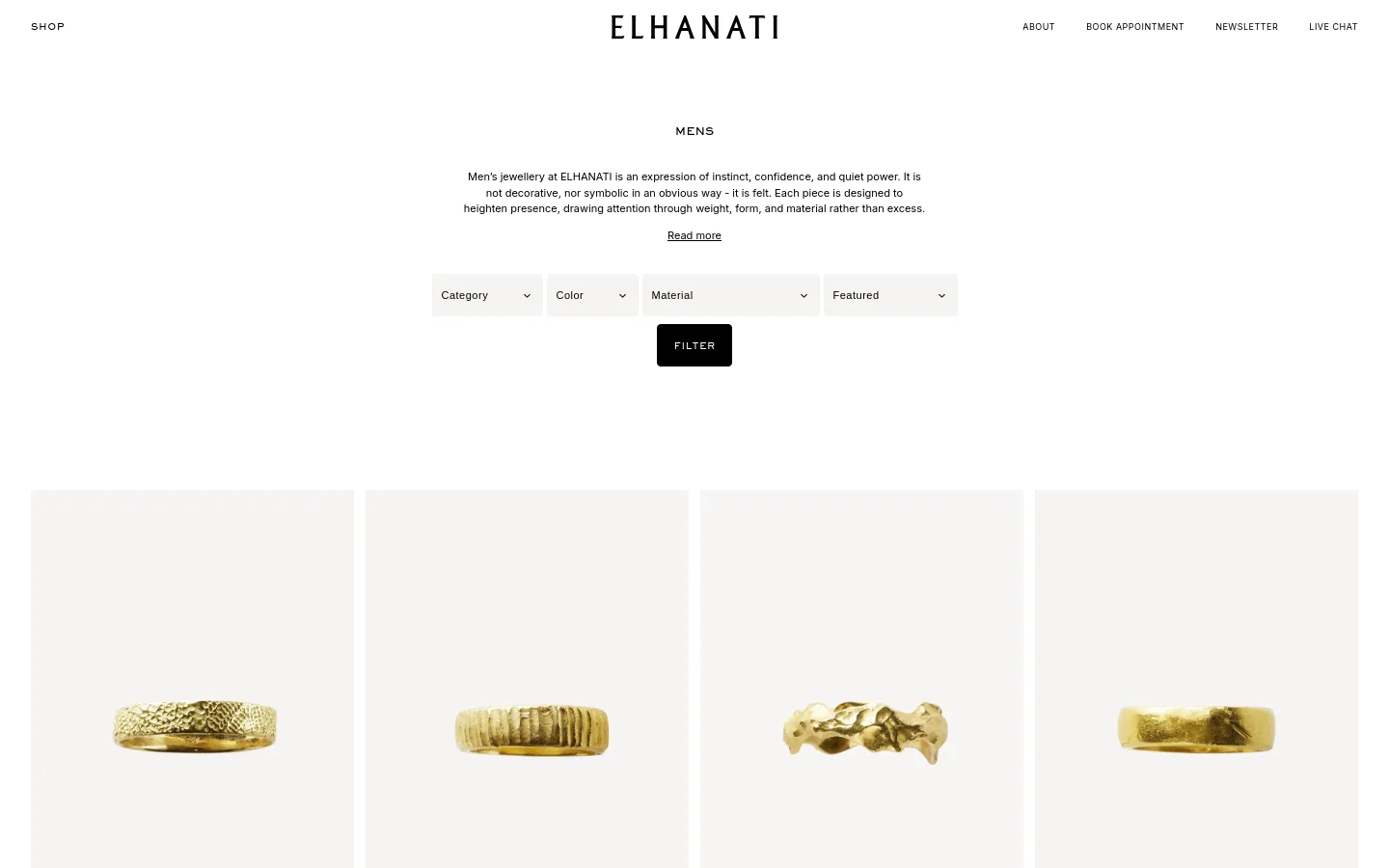 The desktop page features a clean, minimalist layout with a white background and black text. A centered heading 'MENS' is followed by a brief description and a 'Read more' link, with dropdown filters for Category, Color, Material, and Featured above a large 'FILTER' button. Below, a grid of high-quality product images showcases various gold rings against a light neutral background.