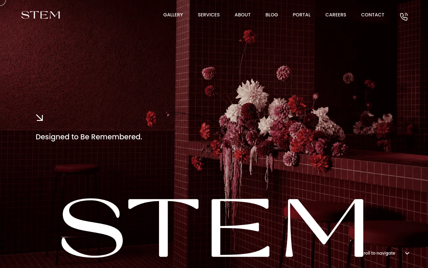 The desktop homepage features a dark, moody aesthetic with a large hero image of a floral arrangement against a red tiled wall. A white 'STEM' logo is in the top left, with a horizontal navigation menu including Gallery, Services, About, Blog, Portal, Careers, and Contact. The headline 'Designed to Be Remembered' sits above a large, stylized 'STEM' text overlay at the bottom.