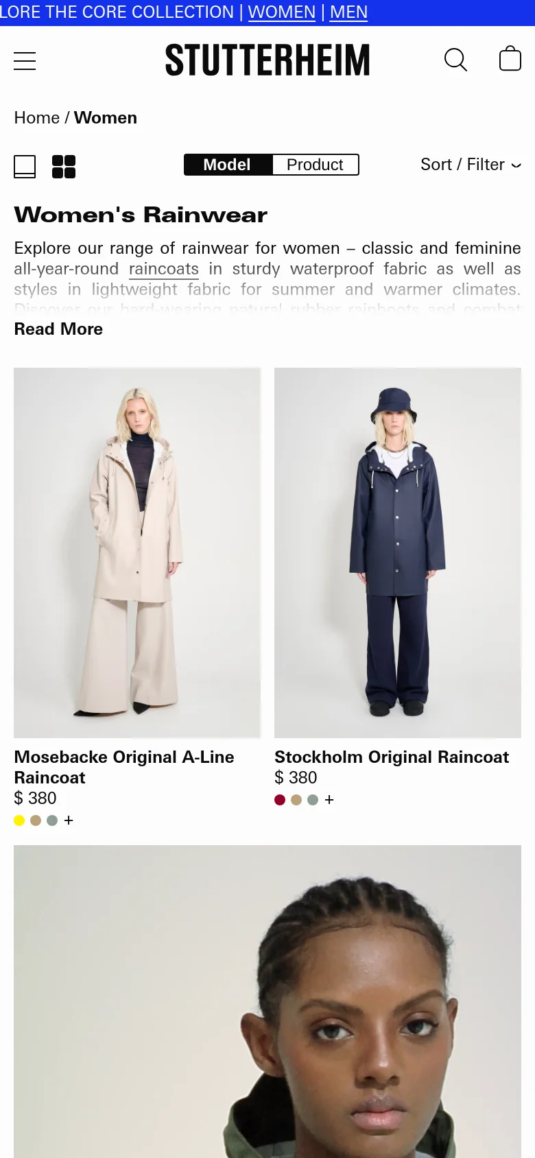 The mobile version presents a vertically stacked layout optimized for smaller screens, with the header and navigation condensed. The 'Women's Rainwear' title is prominent, followed by a 'Read More' expandable text section. Product listings appear as large, single-column or two-column image cards with titles and prices, maintaining the minimalist aesthetic of the desktop site.