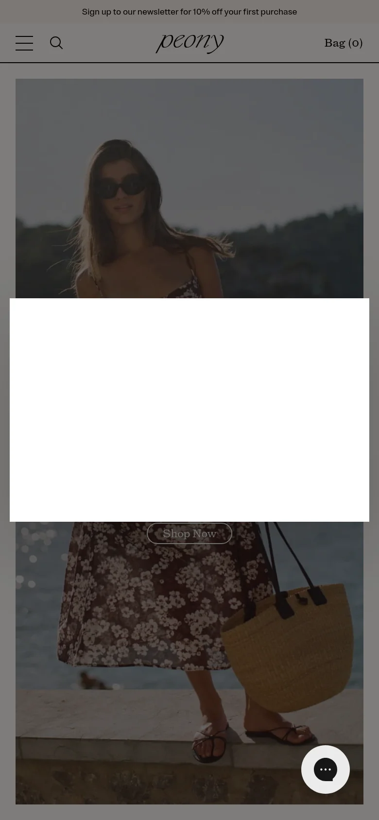 The mobile version presents a vertically stacked layout with a simplified header containing a hamburger menu, search icon, and the peony logo. The hero image is cropped to focus on the model, with the 'CHAPTER TWO' headline and 'Shop Now' button positioned over the central imagery. A newsletter sign-up banner is visible at the very top of the screen.
