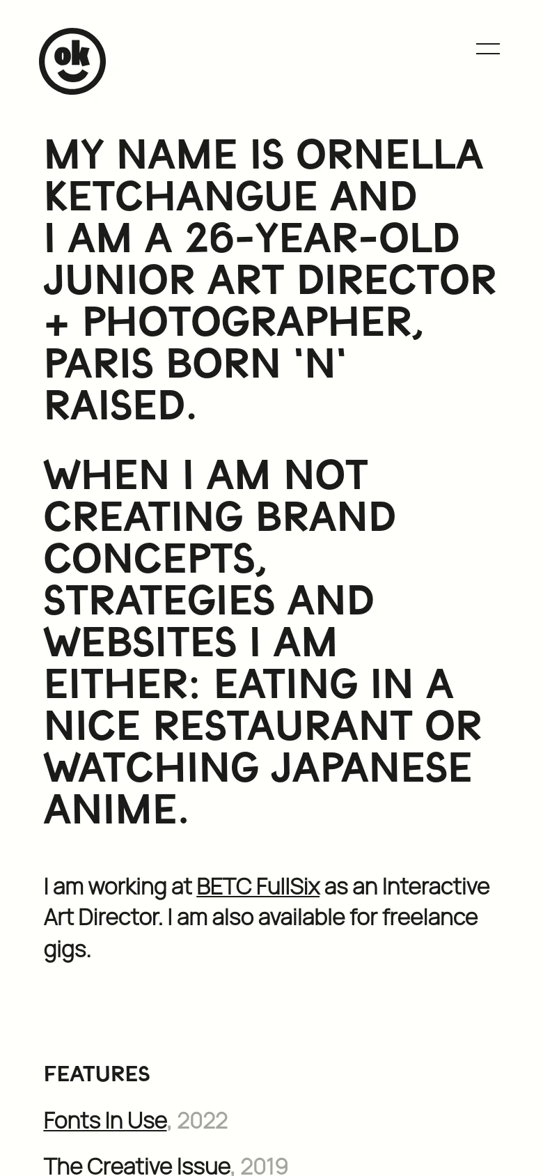 The mobile version presents a vertically stacked layout optimized for small screens, with the large bold headline appearing at the top. A hamburger menu icon replaces the desktop navigation, and the smiley face logo is positioned at the top left. The text content and features list flow in a single column for easy scrolling.