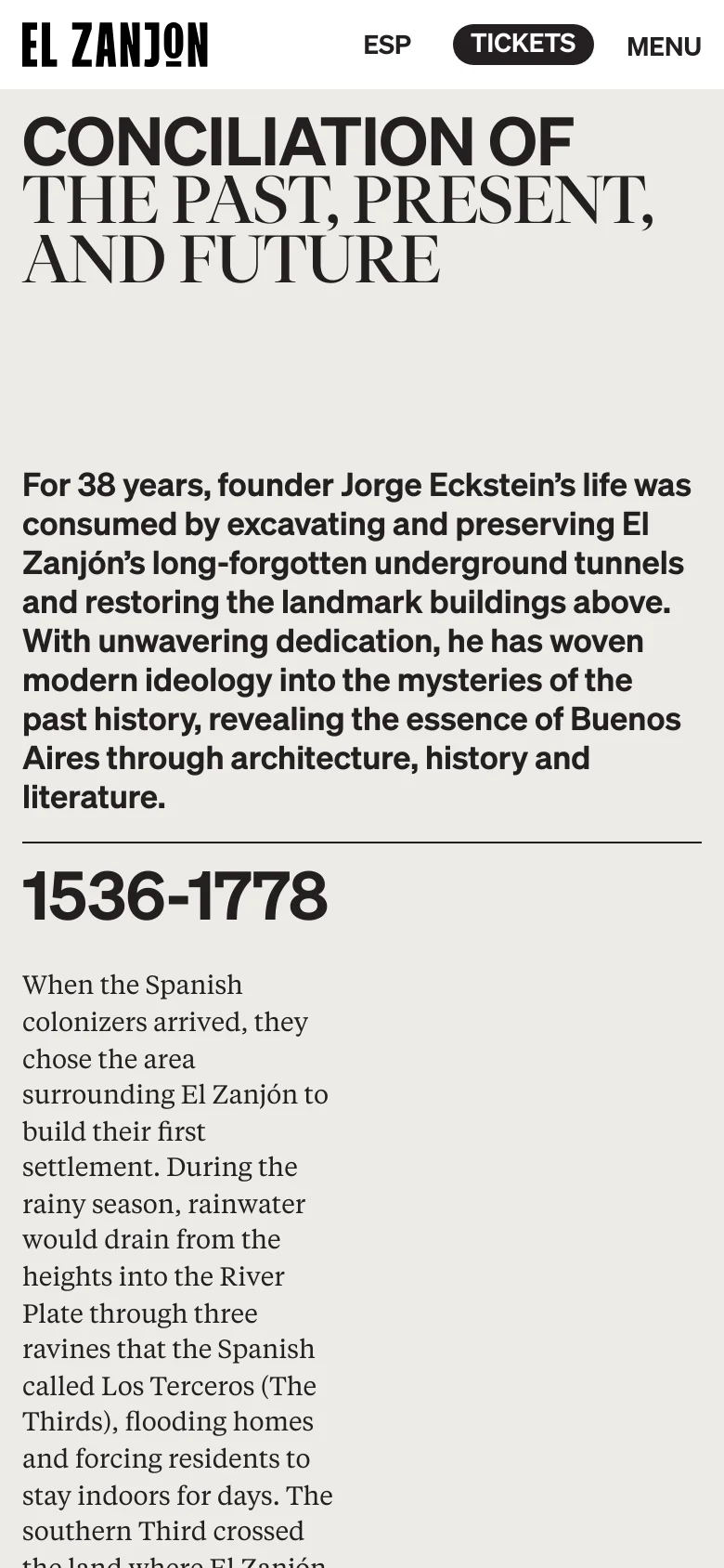 The mobile version maintains the minimalist white and black aesthetic but uses a single-column layout. The large headline and text are stacked vertically for readability, with the historical timeline content flowing downward in a narrow format.