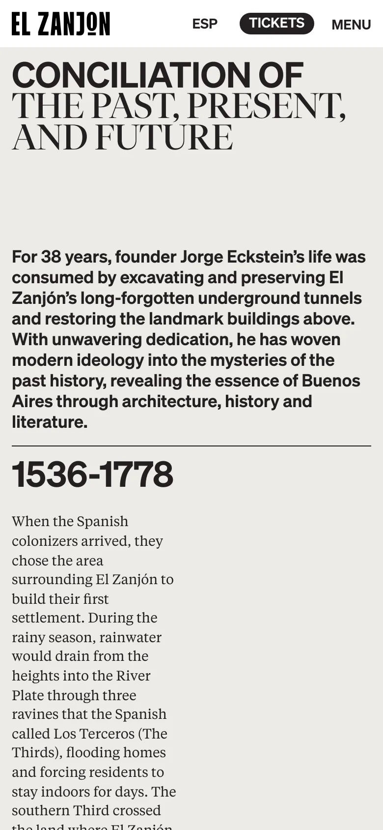 The mobile version maintains the minimalist white and black aesthetic but uses a single-column layout. The large headline and text are stacked vertically for readability, with the historical timeline content flowing downward in a narrow format.