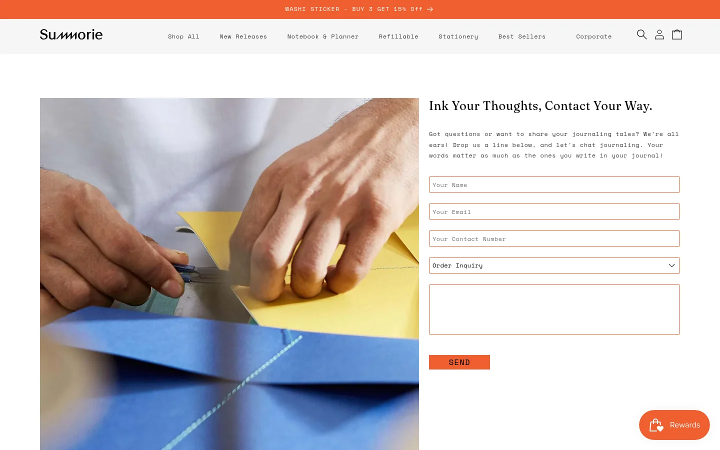 The desktop contact page features a split layout with a large hero image of hands working with colorful paper on the left and a contact form on the right. The headline 'Ink Your Thoughts, Contact Your Way' sits above the form, which includes fields for name, email, contact number, and inquiry type, all set against a clean white background with an orange 'SEND' button. The navigation bar at the top is white with black text and includes links for Shop All, New Releases, and more.