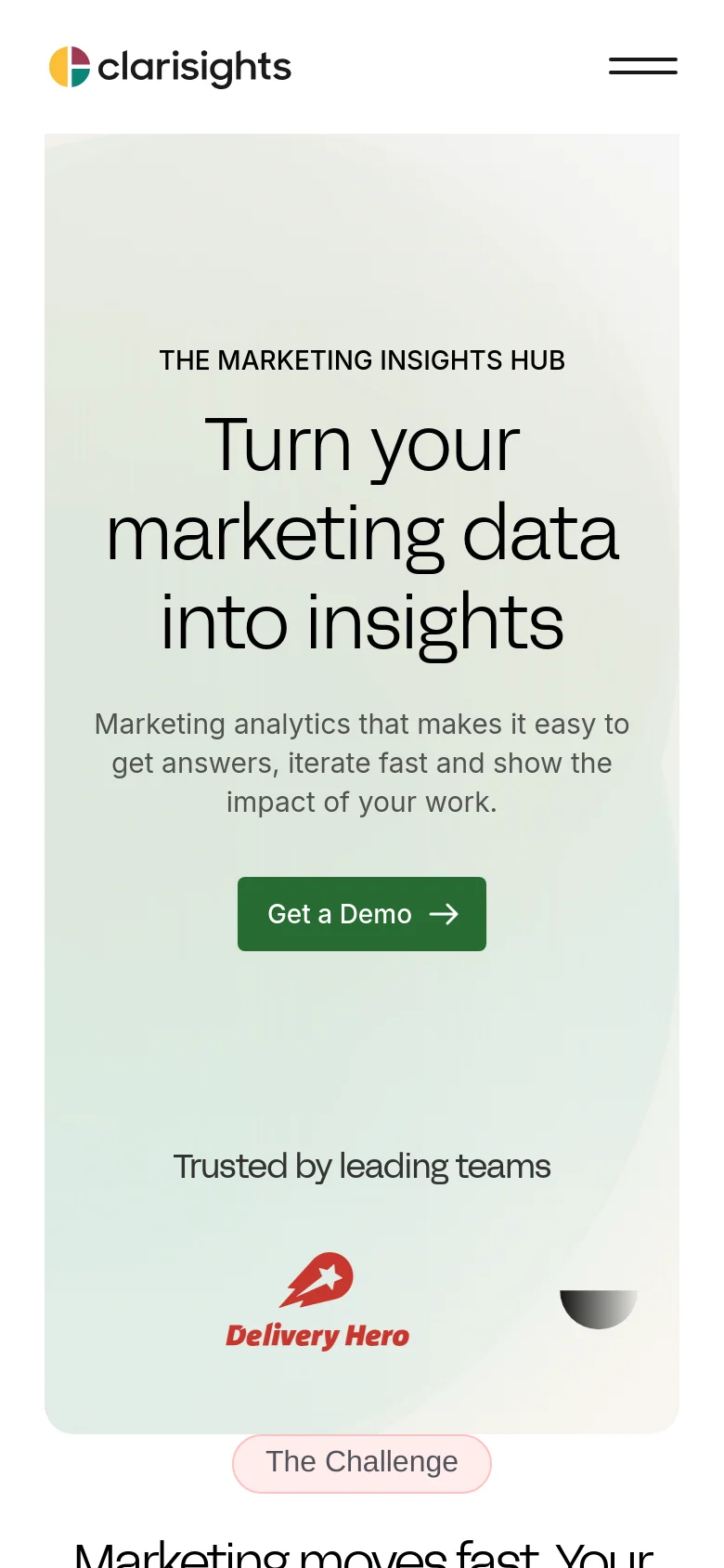 The mobile version presents a vertically stacked layout with the same light beige color scheme. The headline and subheadline are centered and scaled for smaller screens, followed by a prominent dark green 'Get a Demo' button. The 'Trusted by leading teams' section and company logos are repositioned to fit the narrow viewport width.