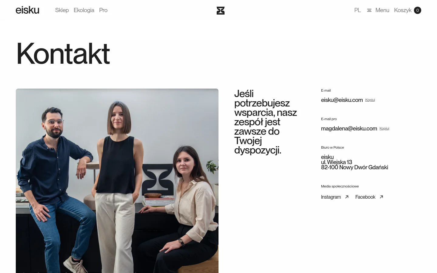 The desktop contact page features a large 'Kontakt' headline above a split layout. On the left, a large photograph shows three team members in a modern office setting, while the right side contains contact details including two email addresses, a physical office address in Poland, and social media links for Instagram and Facebook against a white background.