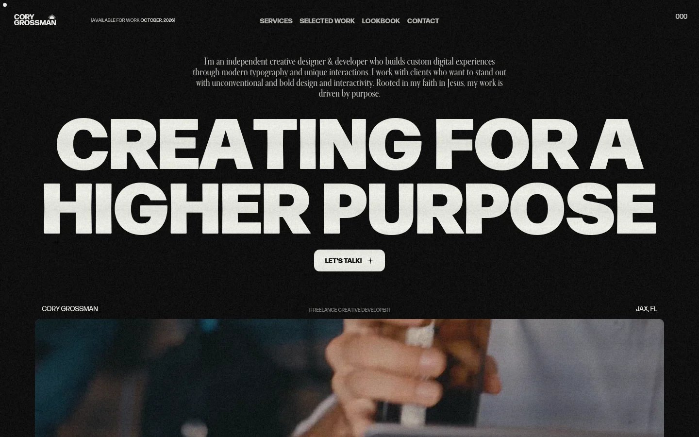The desktop homepage features a dark, minimalist aesthetic with bold, white sans-serif typography. A large hero headline reads 'CREATING FOR A HIGHER PURPOSE' centered over a video background, with a 'LET'S TALK!' call-to-action button below. The navigation menu is spread across the top, and the footer contains the designer's name and location.