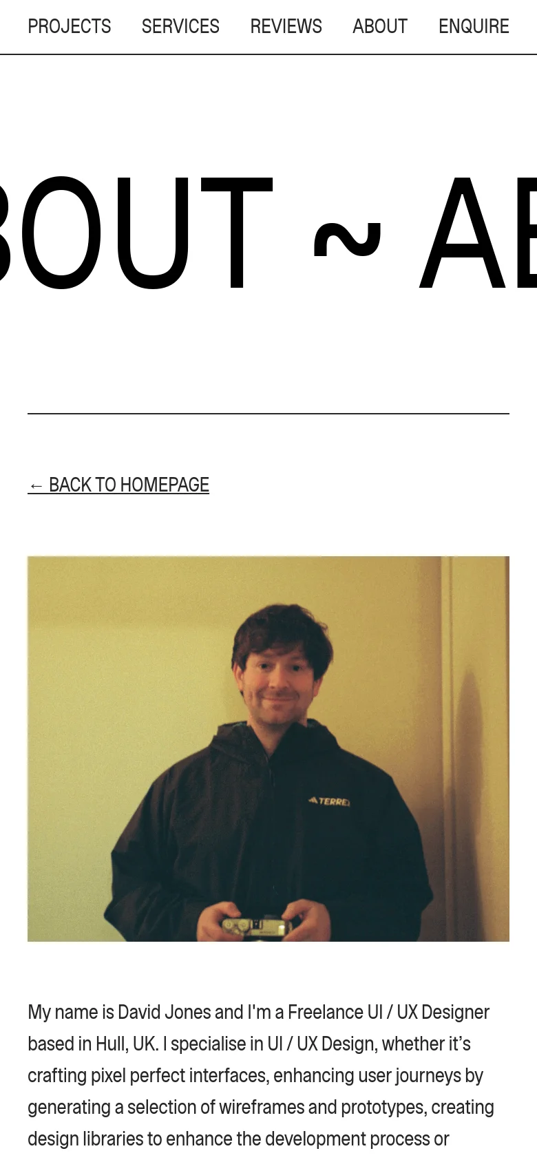 The mobile version maintains the minimalist white and black aesthetic but uses a stacked layout. The large 'ABOUT' header is partially visible at the top, followed by the 'Back to Homepage' link and the portrait image, with the biographical text flowing underneath the photo.