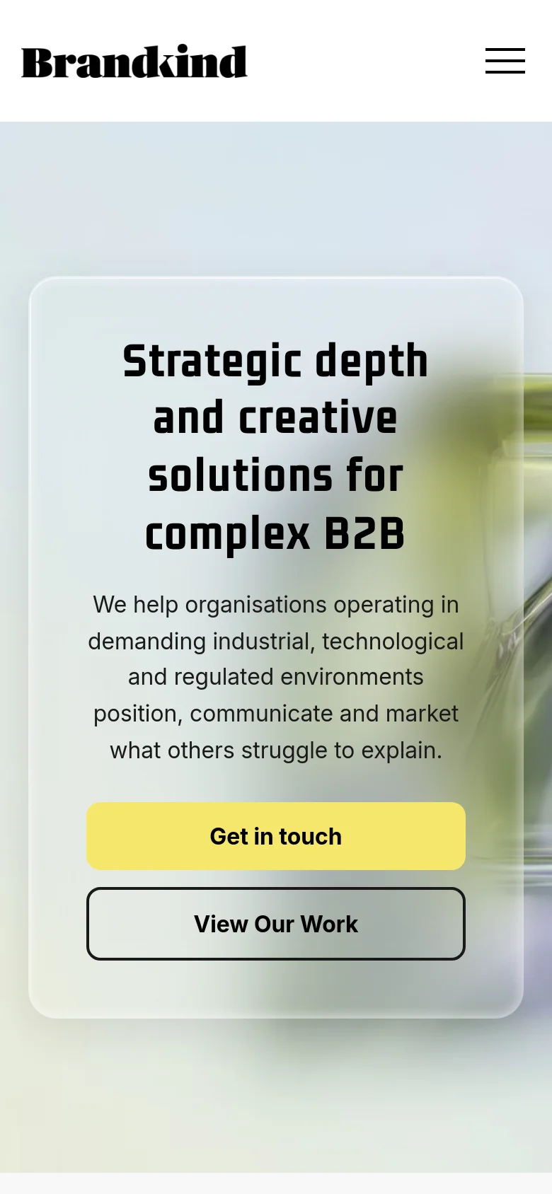 The mobile version uses a stacked layout with a centered design. The headline and text are contained within a translucent white rounded card that overlays a blurred background of the 3D glass sculpture. The navigation is condensed into a hamburger menu icon at the top right, and the 'Get in touch' and 'View Our Work' buttons are stacked vertically for easier tapping.