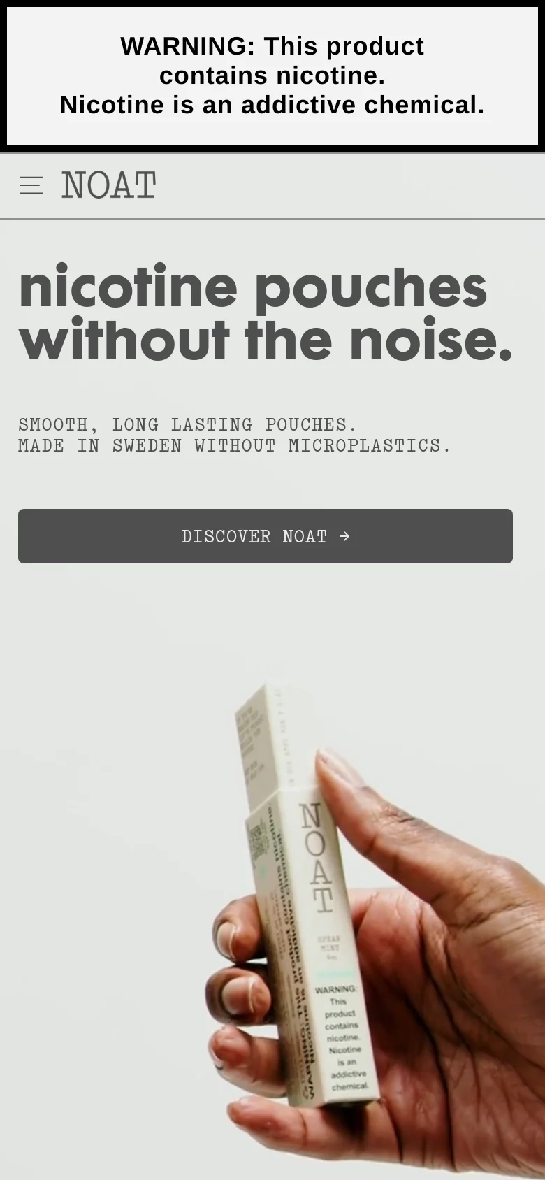 The mobile version maintains the minimalist light gray aesthetic and nicotine warning banner but uses a single-column layout. The hero headline and 'DISCOVER NOAT' button are stacked vertically above the large image of a hand holding the product pack, optimizing the view for vertical scrolling.