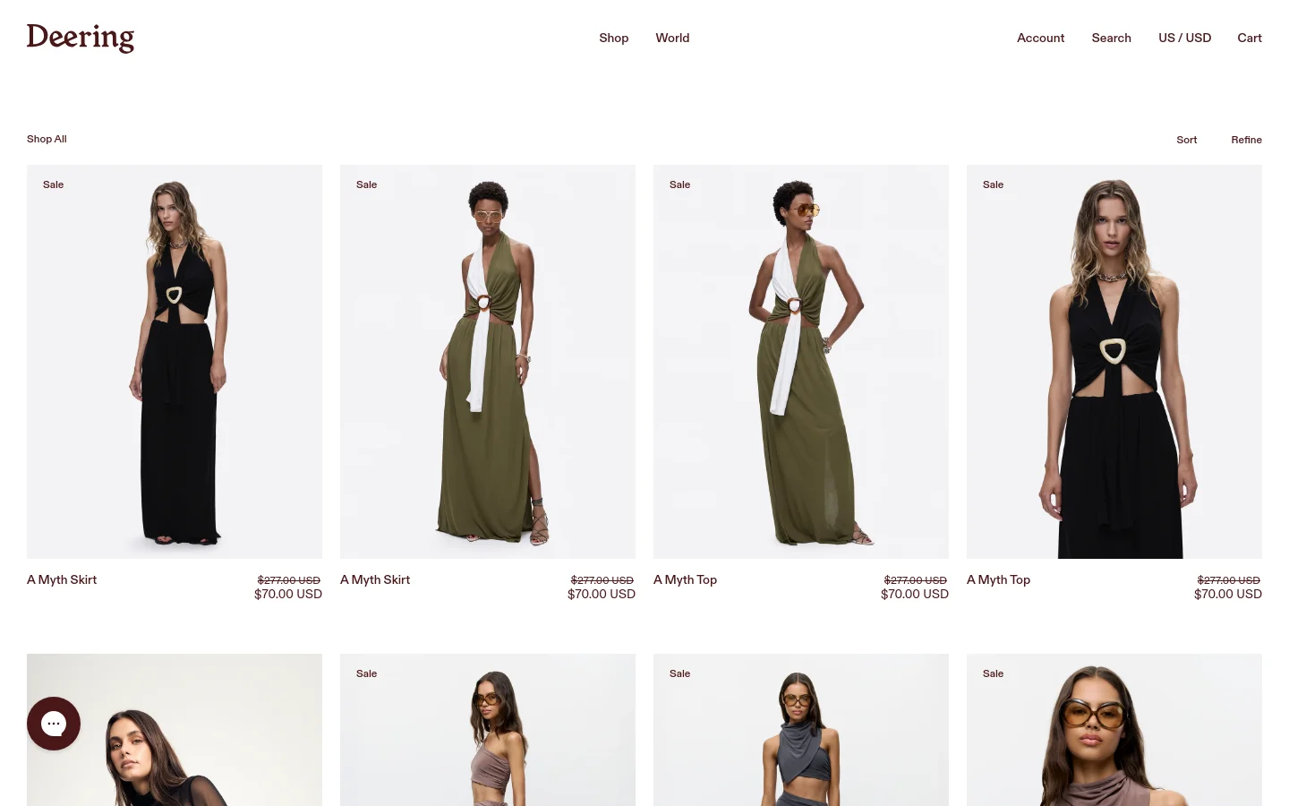 The desktop shop page features a clean white background with a grid of fashion product images. A top navigation bar includes the Deering logo, links for Shop and World, and utility links for Account, Search, Currency, and Cart. Below the header, a 'Shop All' heading is followed by 'Sort' and 'Refine' options, with product cards displaying high-quality photography of models in skirts and tops, accompanied by product names and sale prices.