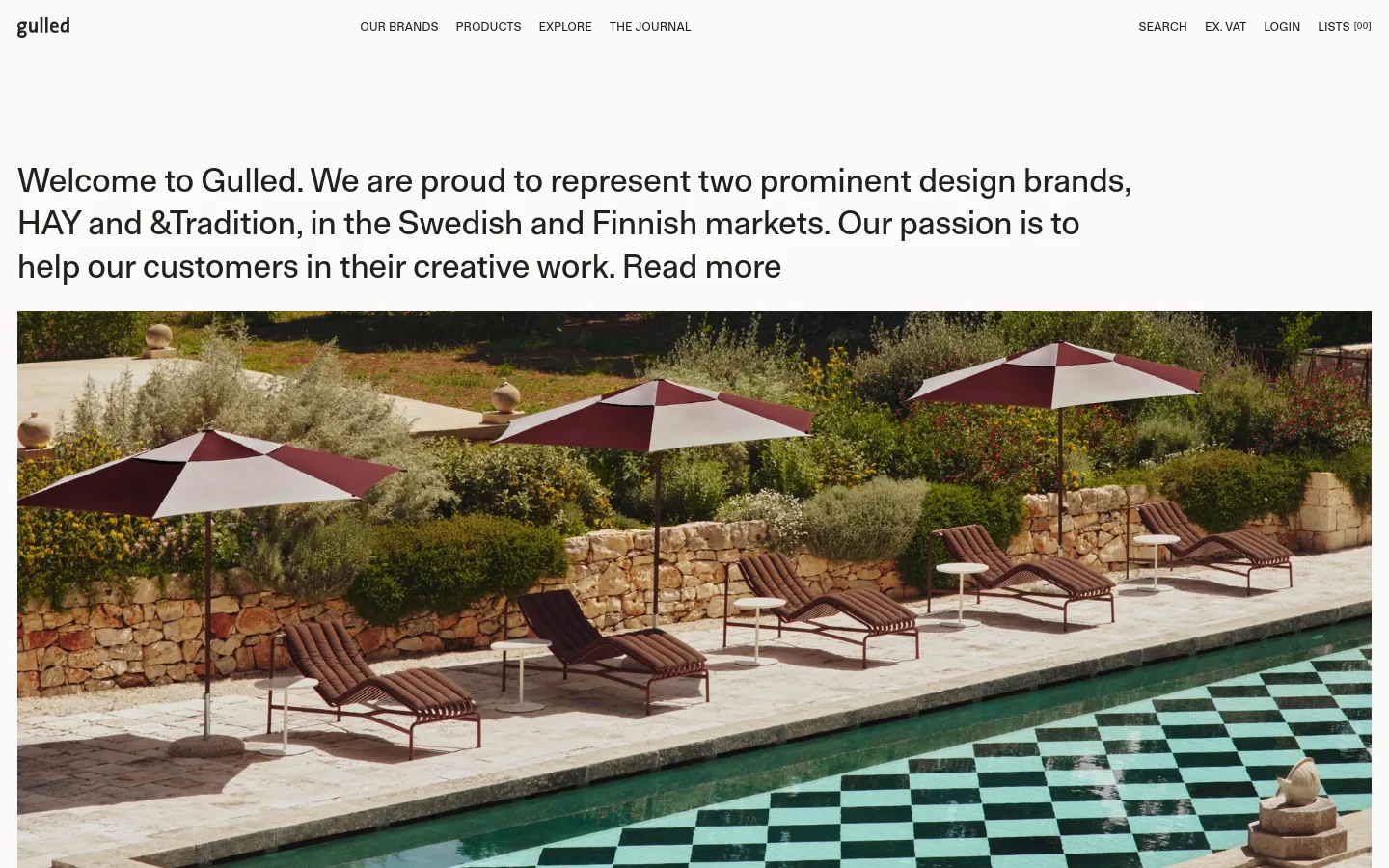 The desktop homepage features a clean, minimalist white layout with a top navigation bar including links for brands, products, and explore. A large introductory text welcomes visitors to Gulled, followed by a wide hero image of an outdoor poolside setting with red lounge chairs and umbrellas. Below the hero section, a product grid displays various HAY design items against a light background.