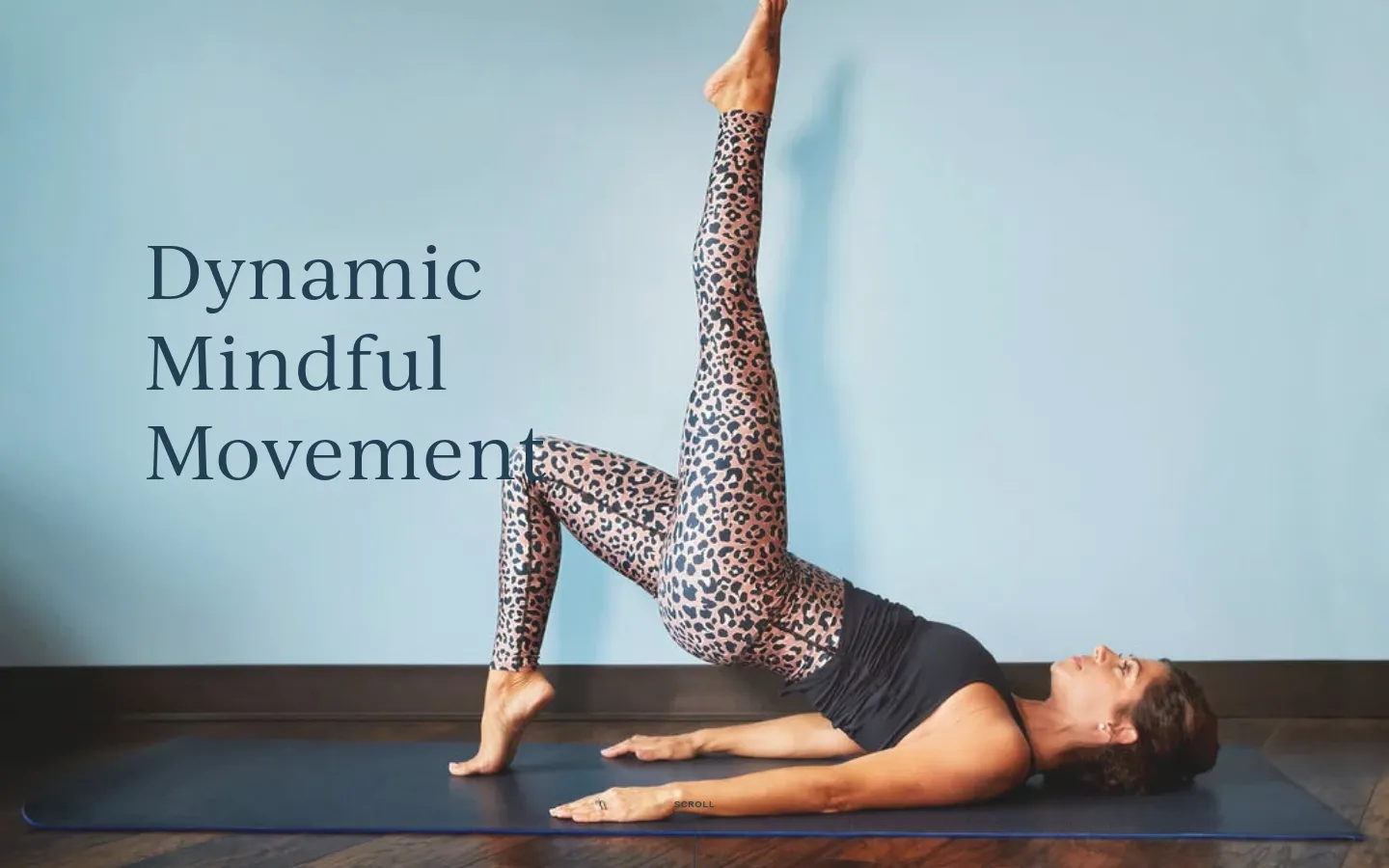 The desktop homepage features a large hero image of a woman in leopard print leggings performing a yoga pose against a light blue wall. The headline 'Dynamic Mindful Movement' is displayed in a serif font on the left, with a primary call to action button labeled 'FULFILL YOUR PERSONAL MOVEMENT POTENTIAL' below a subheadline. The layout is clean with a white navigation bar at the top containing the brand name and a hamburger menu.