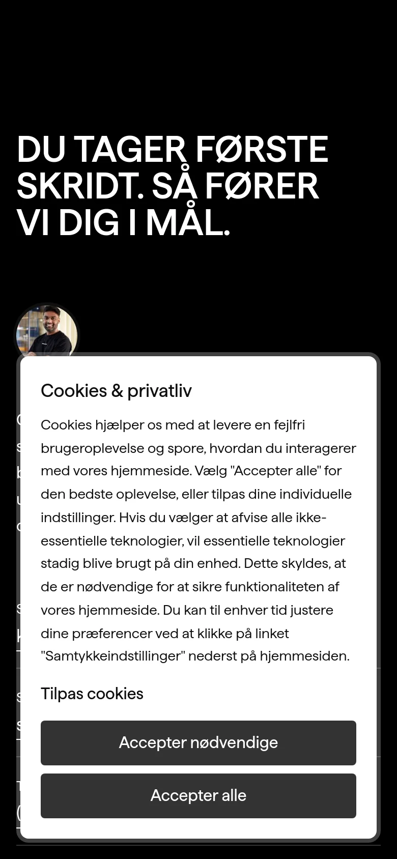 The mobile version presents a vertically stacked layout on a black background. The large white headline dominates the top, followed by a circular profile image of Kiranan Luxmy. Contact details such as email links and the phone number are arranged in a single column for easy scrolling, and a cookie consent modal overlays the bottom half of the screen.