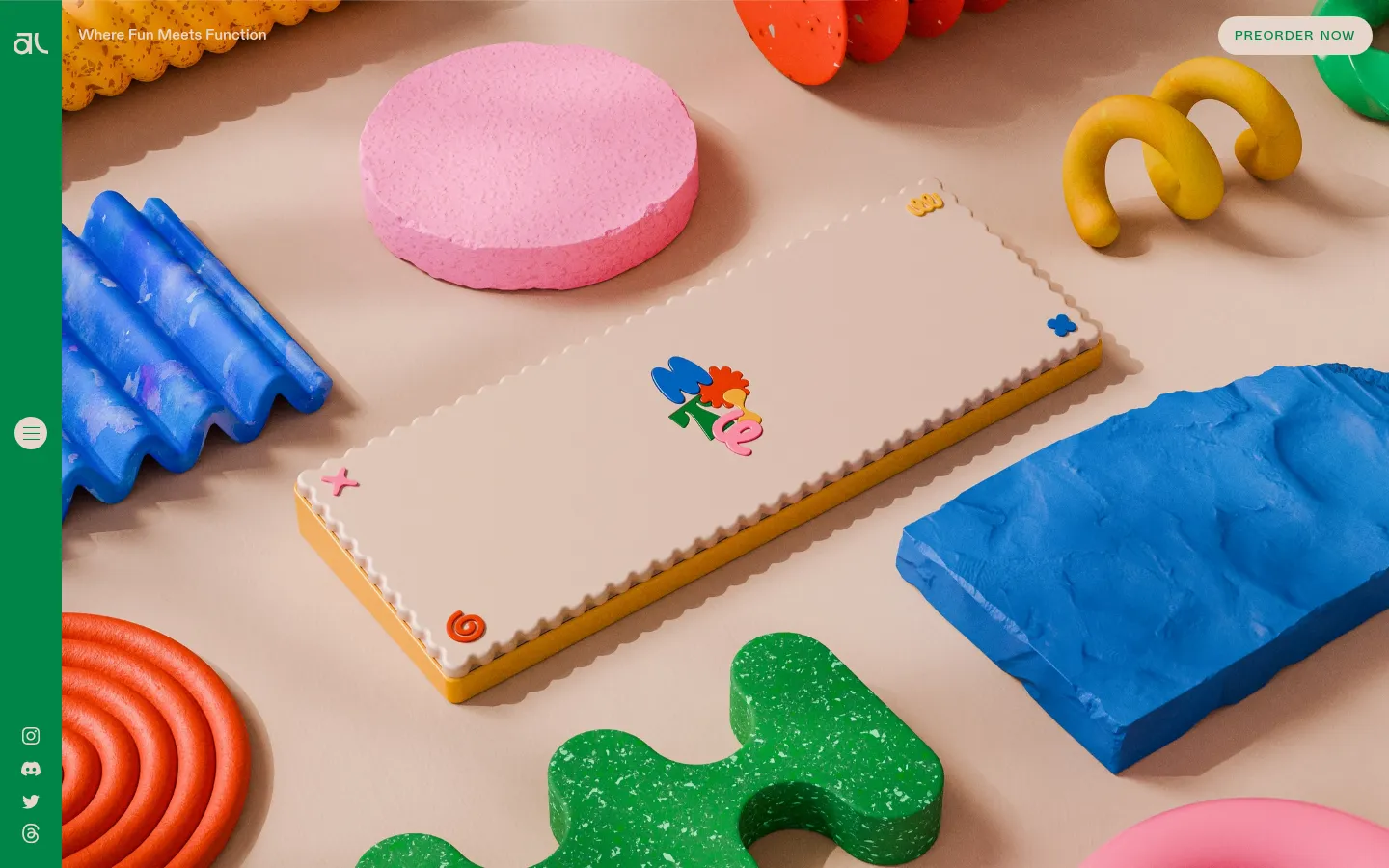 The desktop landing page features a high-angle, close-up shot of a beige Motif65 mechanical keyboard surrounded by colorful, textured geometric shapes in pink, blue, green, and orange. A white 'PREORDER NOW' button is located in the top right corner against a green header bar. The layout is minimalist with a warm, playful aesthetic using soft shadows and pastel tones.