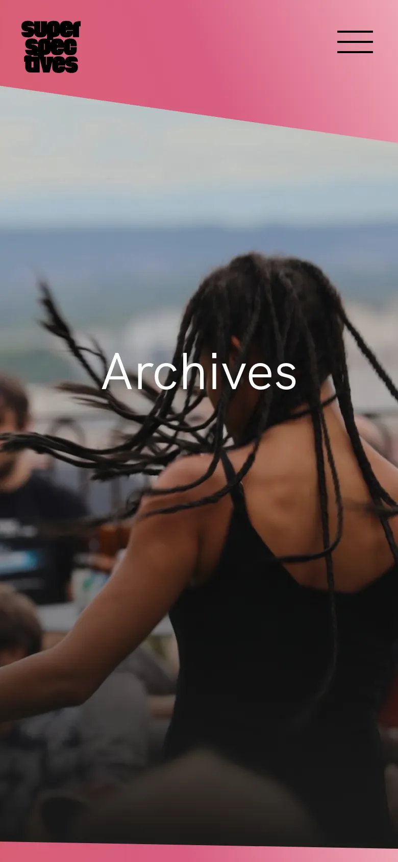 The mobile version displays a simplified header with the Superspectives logo on the left and a three-line hamburger menu icon on the right against a pink background. The large hero image of the performer remains the central focus, with the 'Archives' title centered prominently over the image.