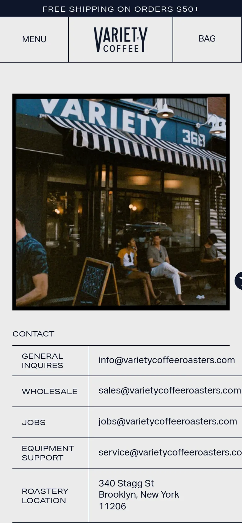 Variety Coffee contact page on mobile with a stacked layout. A large photo of the cafe storefront sits above a vertical list of contact sections including General Inquiries, Wholesale, and Roastery Location details on a cream background.