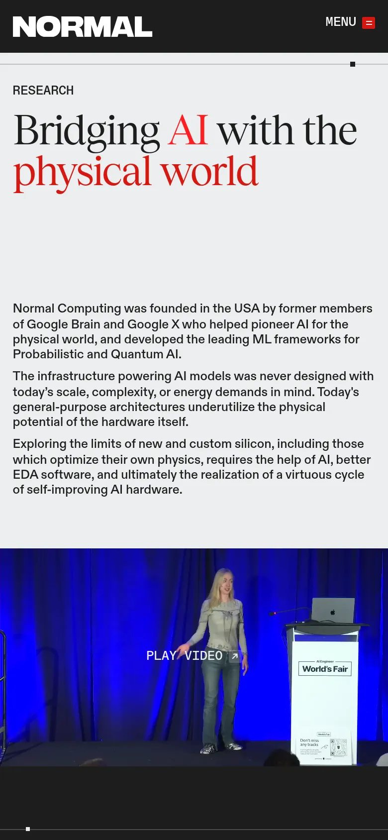 The mobile version presents a vertically stacked layout on a light gray background, centering the large 'Bridging AI with the physical world' headline. The text content is arranged in a single column for readability, followed by a full-width video section with a prominent 'PLAY VIDEO' overlay. A hamburger menu icon is visible at the top right for navigation.