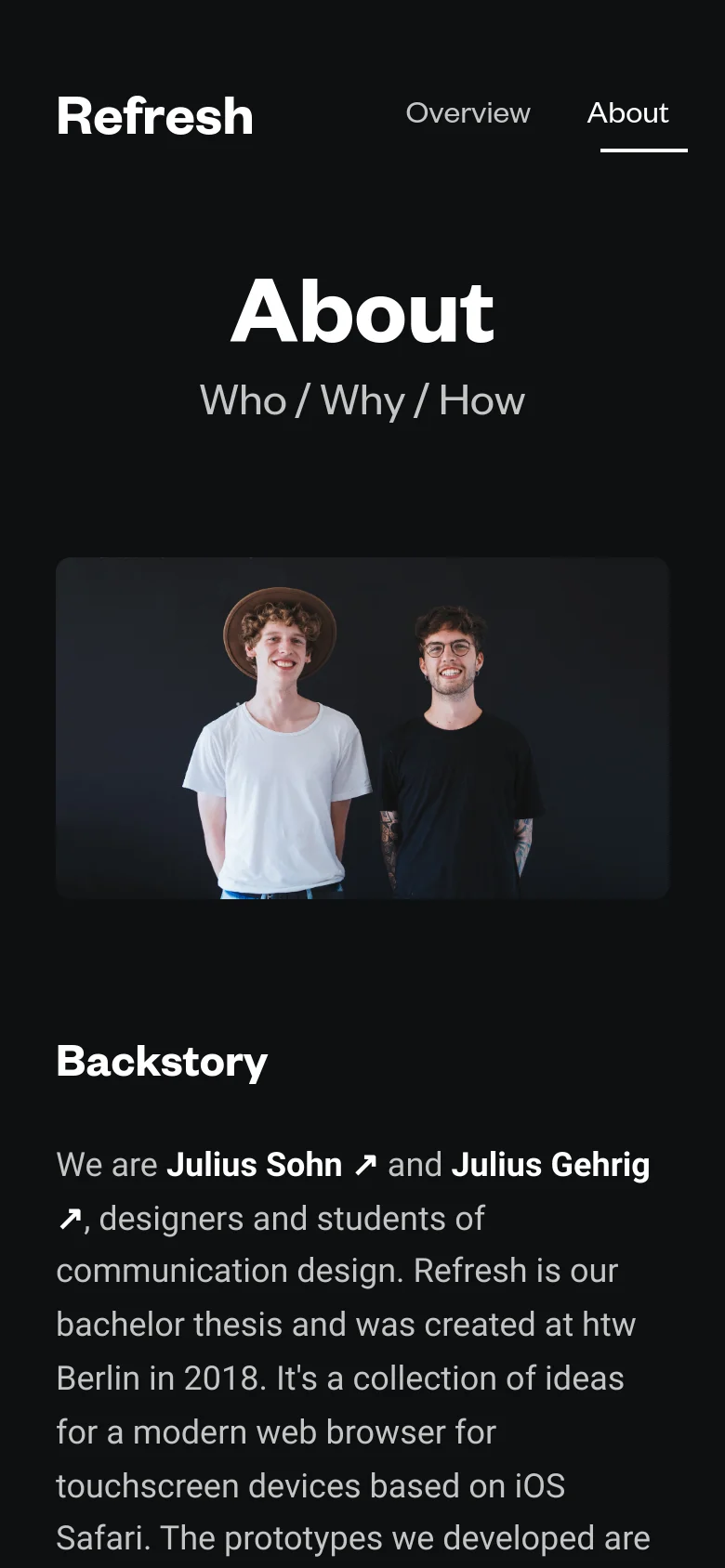 The mobile version maintains the dark theme and centered white typography, but the layout is vertically stacked for a narrow screen. The hero image of the two men is scaled down to fit the width, and the navigation links are positioned at the top, with 'About' underlined to indicate the active page.