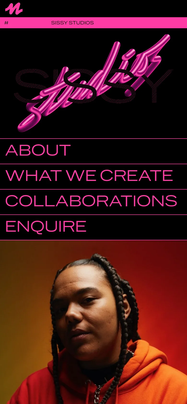 The mobile version presents a vertically stacked layout with a pink header containing the Sissy Studios title. The hero section features the same pink 3D 'SISSY STUDIOS' graphic, followed by the main navigation links in large pink text. The bottom of the screen shows a close-up portrait of a person in an orange hoodie against a colorful background.