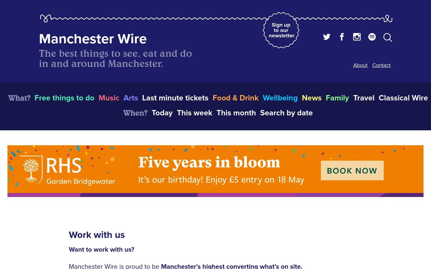 The desktop page features a dark blue header with the Manchester Wire logo, social media icons, and a navigation menu. Below the header, a large orange banner advertisement for RHS Garden Bridgewater spans the width of the page, followed by a white content area with the headline 'Work with us' and text details about advertising opportunities.