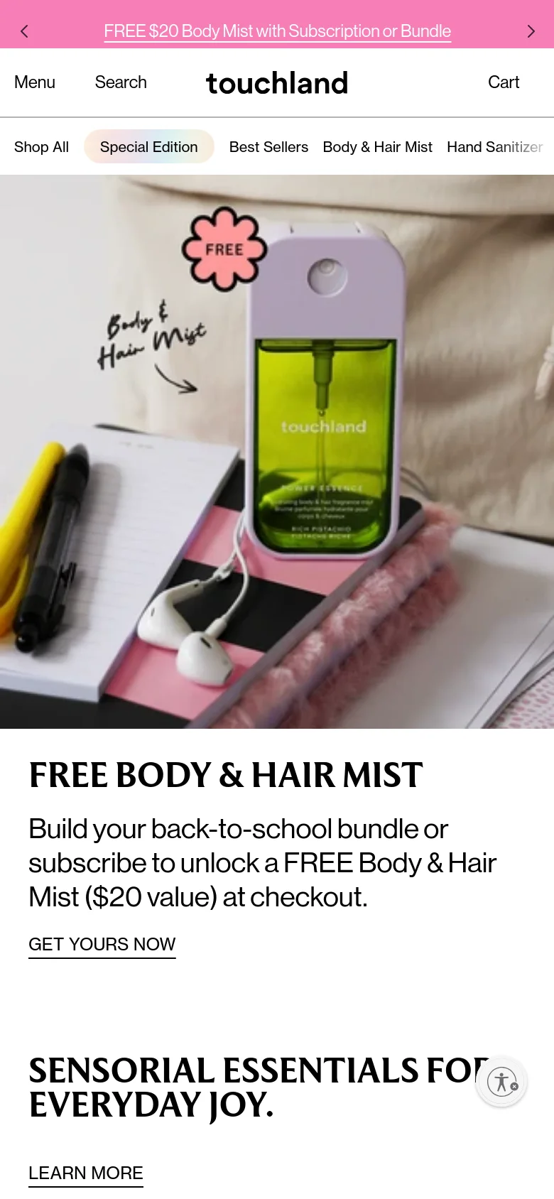 The mobile version presents a vertically stacked layout optimized for scrolling, starting with a pink promotional banner at the top. The hero section features the same lime-green mist sprayer image, but the text 'FREE BODY & HAIR MIST' and the call-to-action 'GET YOURS NOW' are centered below the image for easier tapping. The navigation menu is condensed into a simplified header with 'Menu', 'Search', and 'Cart' options.