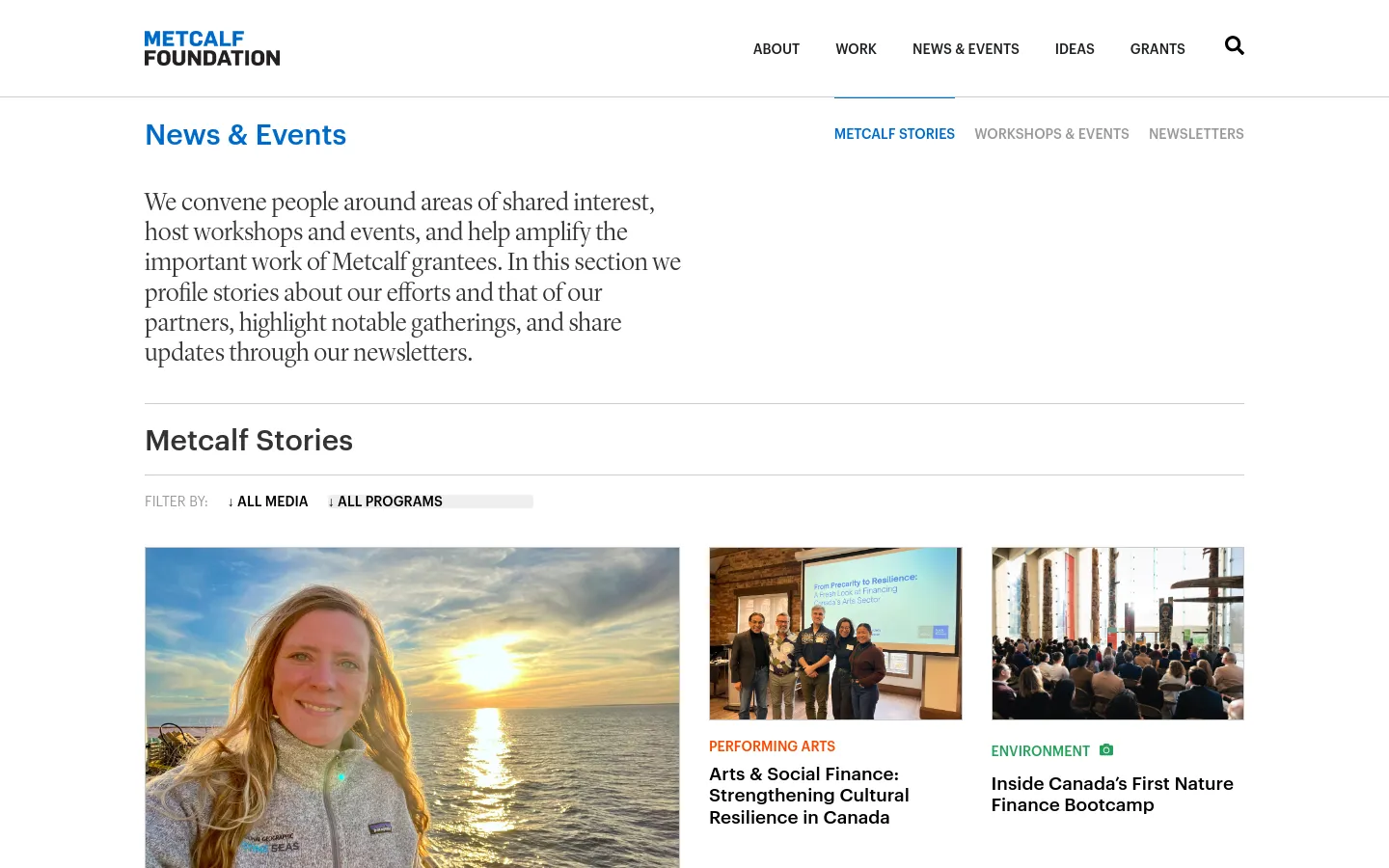 The News & Events page features a clean white background with blue and black text. A sub-navigation menu includes links for Metcalf Stories, Workshops & Events, and Newsletters. Below, a 'Metcalf Stories' section displays a grid of large image cards with headlines, including a portrait of a woman against a sunset ocean backdrop.