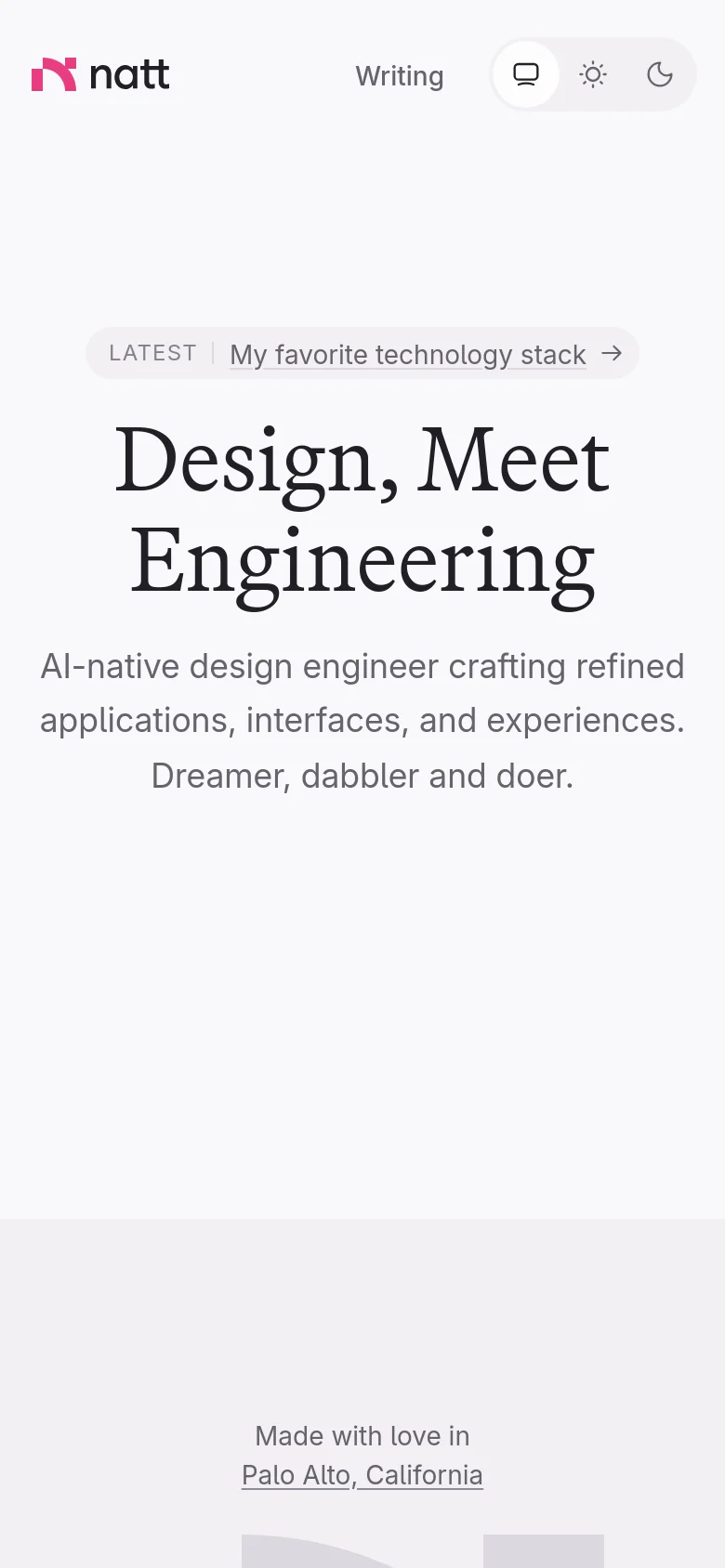 The mobile version maintains the minimalist white aesthetic but centers all content vertically. The header contains the logo, 'Writing' link, and theme toggles, while the hero text and 'Latest' pill link are stacked centrally to fit the narrow viewport.