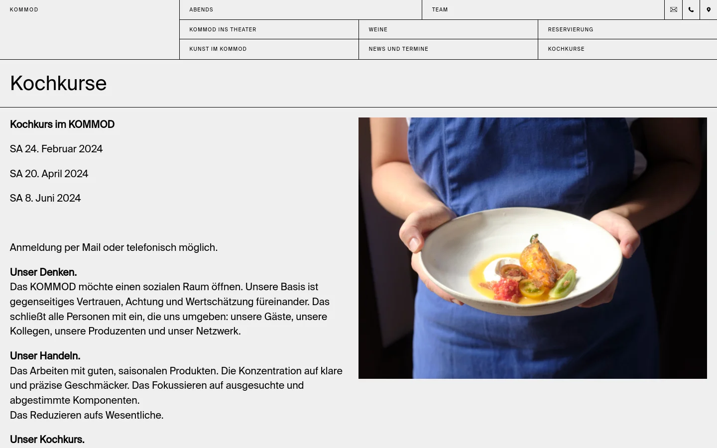 The desktop page features a clean, minimalist layout with a white background and black text. A large headline reads 'Kochkurse' above two columns: the left column contains text details about cooking course dates, philosophy, and pricing, while the right column displays a large hero image of a person in a blue apron holding a plated dish. A navigation menu is visible at the top with various links like 'WEINE' and 'RESERVIERUNG'.