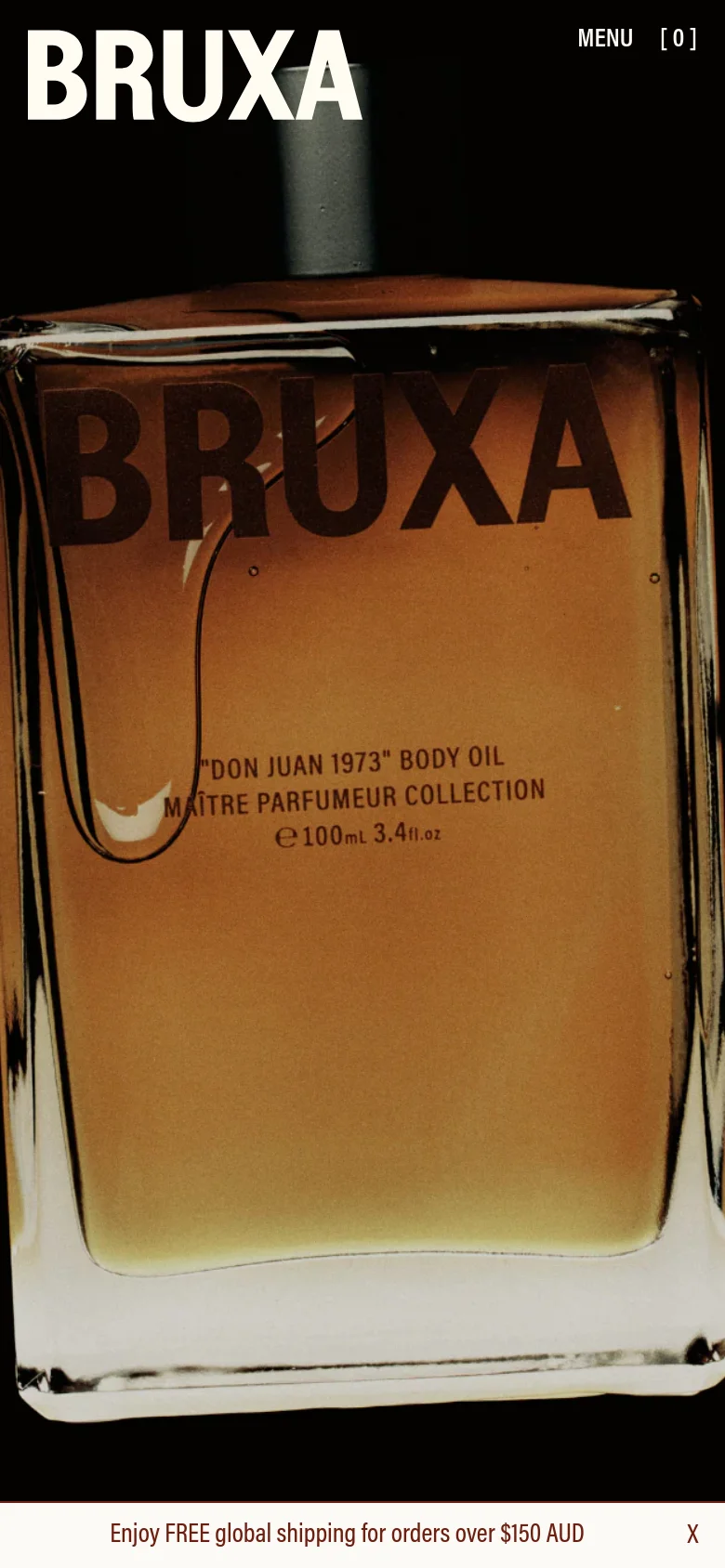 The mobile version presents a vertically oriented, close-up view of the perfume bottle, filling most of the screen. The BRUXA logo is prominent at the top, while the navigation is condensed into a 'MENU' button and a shopping bag icon at the top right. A promotional banner for free shipping appears at the bottom.