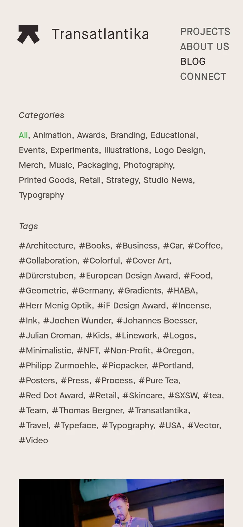 The mobile version of the blog page simplifies the layout into a single vertical column. The sidebar content, including categories and tags, is moved below the main blog post feed, and the navigation menu is condensed for a smaller screen.