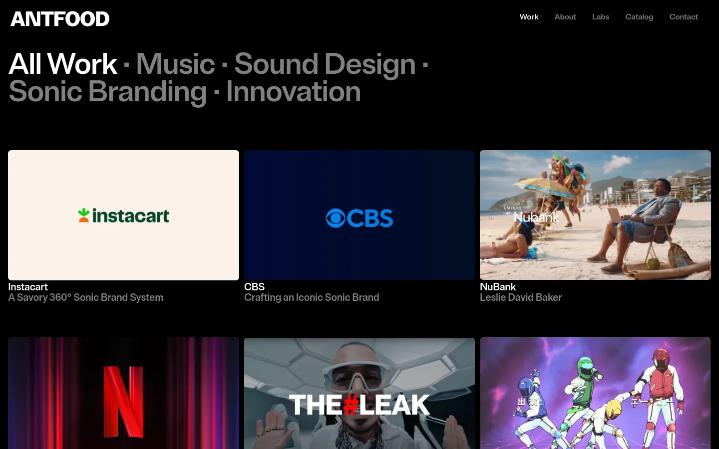 The Work page features a dark background with large white typography for the title 'All Work' and category filters like Music and Sonic Branding. A grid of large video thumbnails showcases projects for brands like Instacart, CBS, and NuBank, each accompanied by a title and brief description. The layout is clean and minimalist, using high-contrast white text on a black backdrop.