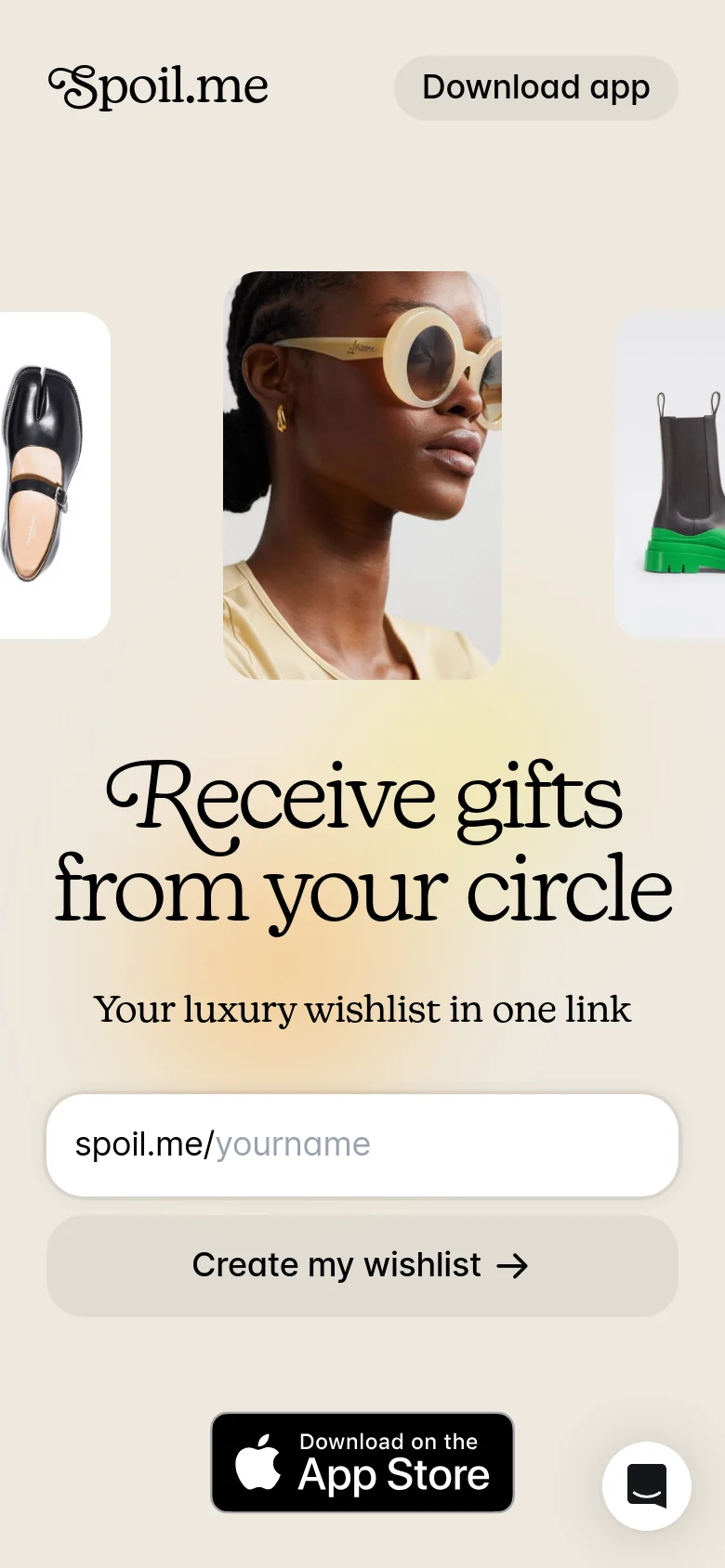 The mobile version presents a simplified, vertically stacked layout on a cream background. It features the Spoil.me logo, a prominent 'Download app' button, and large imagery of luxury items like sunglasses and a tote bag. The central focus is the headline 'Receive gifts from your circle' followed by a personalized wishlist URL input field and a 'Create my wishlist' call to action.