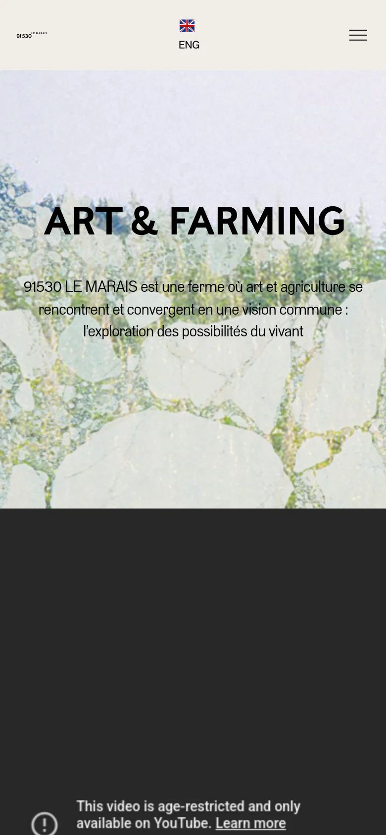 The mobile version presents a simplified layout with the logo, language selector, and a hamburger menu icon at the top. The hero section features the same 'ART & FARMING' headline and descriptive text overlaid on a textured organic background, optimized for a vertical screen.