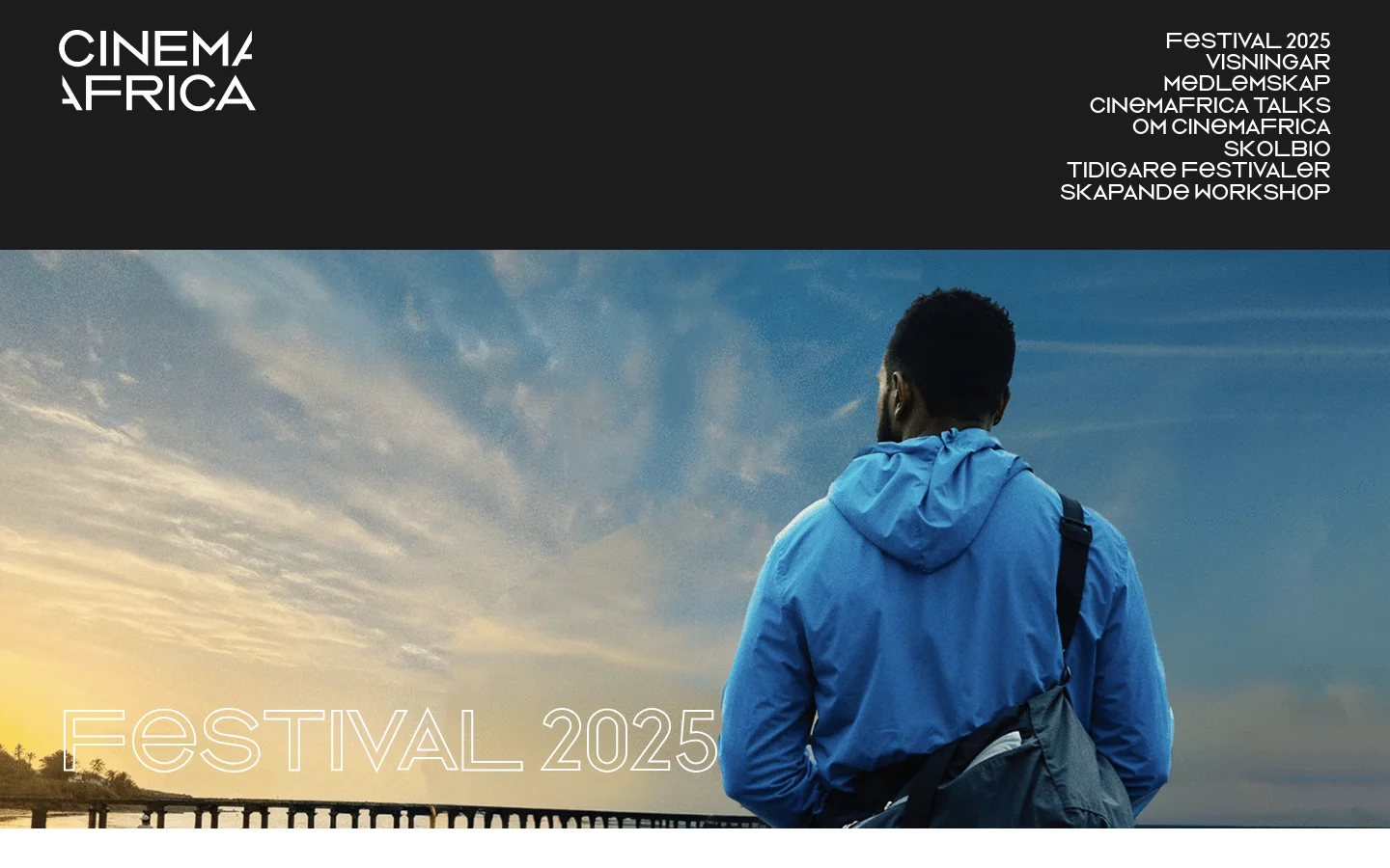 The desktop page features a large hero image of a man in a blue jacket looking out over a coastal landscape at sunset, with the text 'FESTIVAL 2025' overlaid in white. Below the hero section, a clean white layout presents festival details in black text, including headlines about the opening night on October 2nd and the festival dates from October 2-5. The footer is dark with the white 'CINEMA AFRICA' logo on the left and a navigation menu on the right.