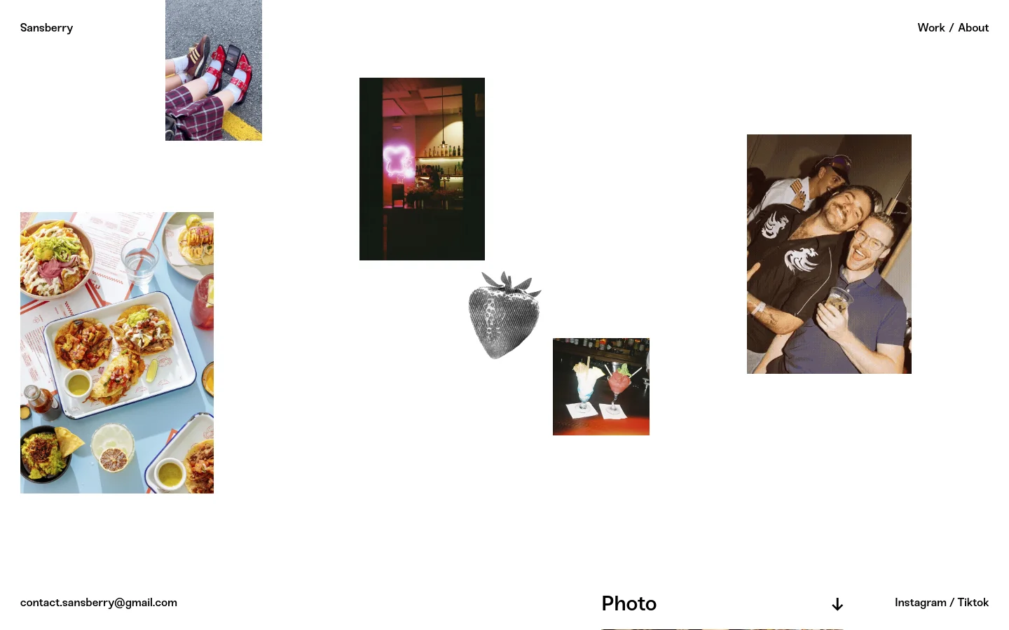 The desktop homepage features a minimalist white background with a navigation menu containing 'Sansberry', 'Work', and 'About'. A grid layout showcases colorful photography projects including food, lifestyle, and product shots, each accompanied by a 'Read More' link. The footer includes contact information and social media links.